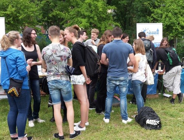 Students gathering in front of the AEGEE booth